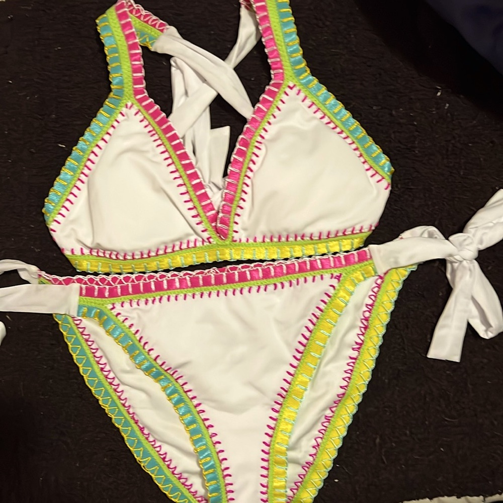 Platinum swimwear inspired by Solange Ferrarini.